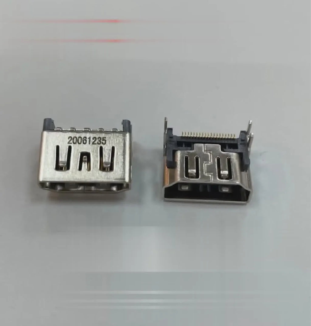 Silver HDMI host interface socket for game console repair and signal connectivity.