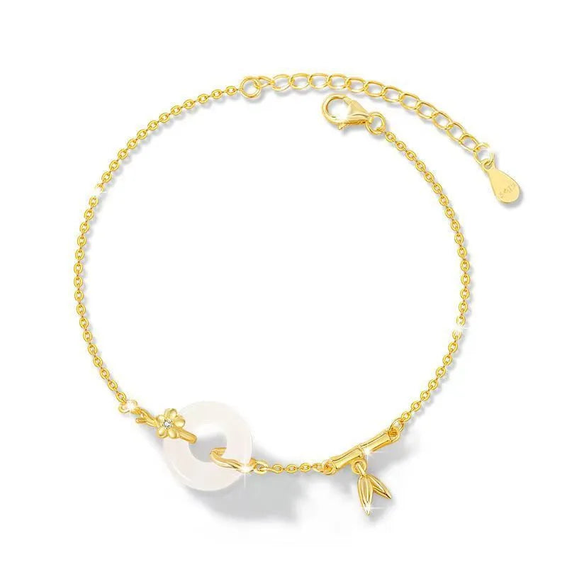 Women's silver bracelet with white chalcedony and starry sky design featuring peace buckle