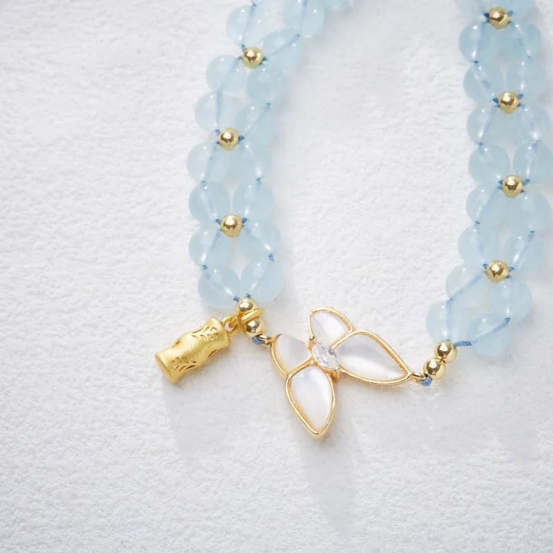Women's aquamarine butterfly woven bracelet with retro style and handmade construction