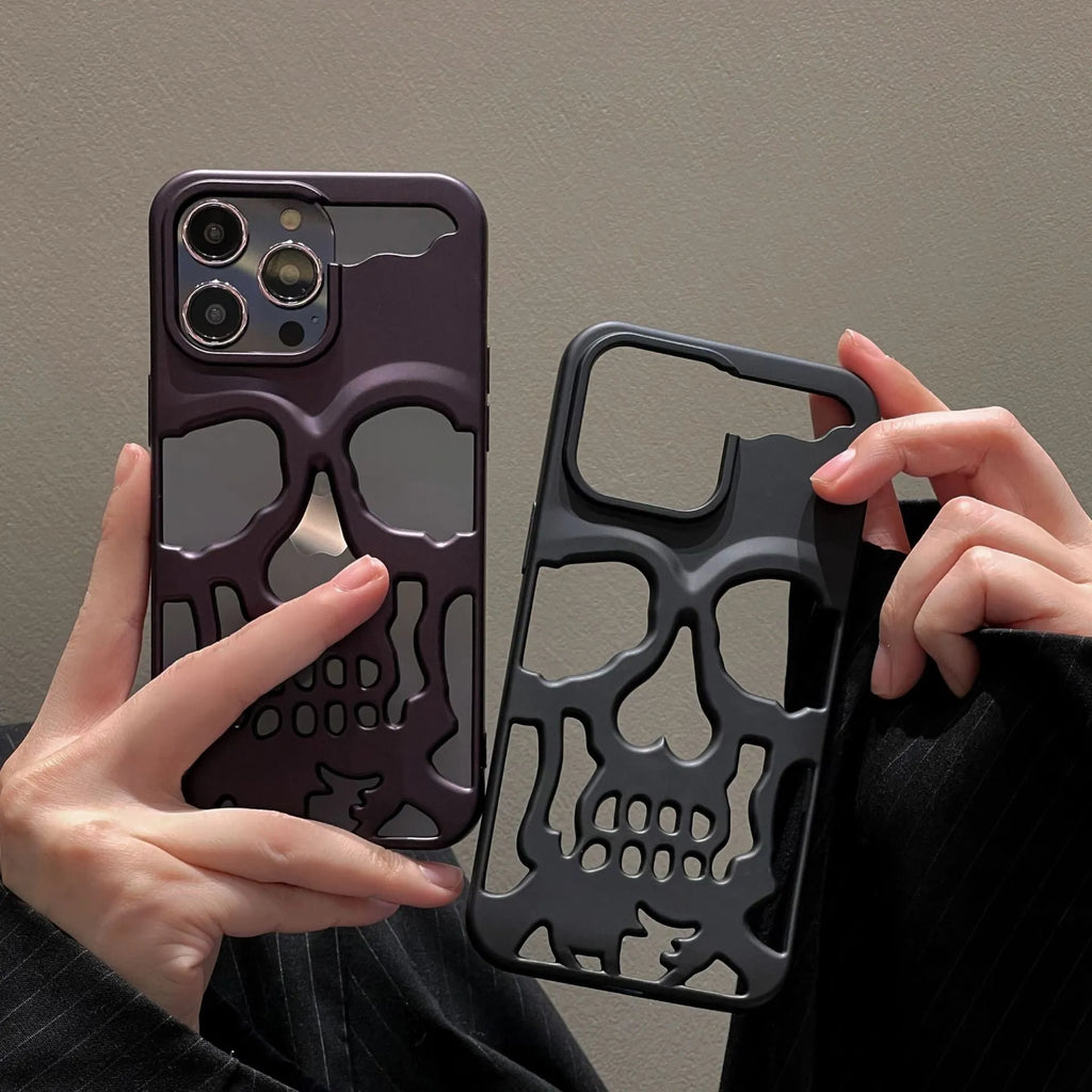 Frosted skull TPU phone case in matte black for iPhone 14 Pro showing hollow skull design