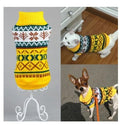 Acrylic dog sweater in grey, shown on a small dog, XS-XXL sizes are available