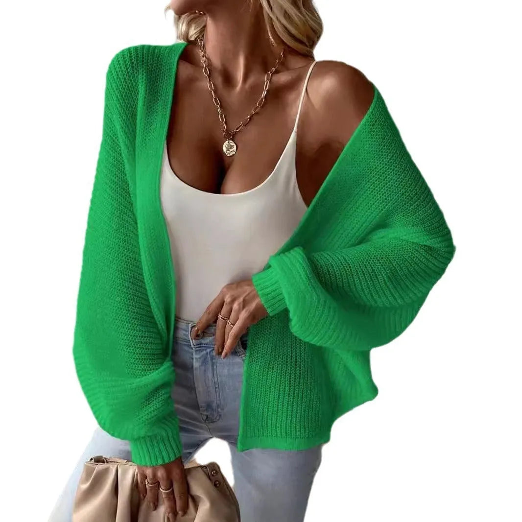 Loose fit polyester cardigan with batwing sleeves in solid colour options