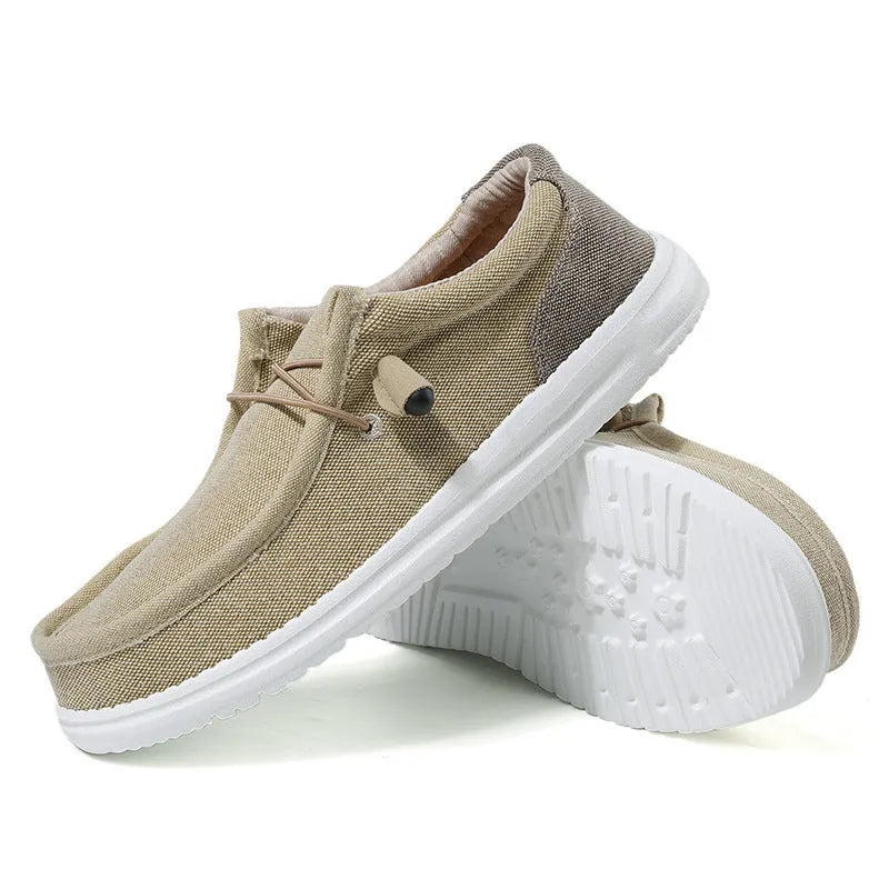 Men's green and orange canvas casual shoes with colourful mosaic panelling and rubber soles