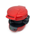 Bright red household breakfast machine with sandwich plates and egg cooker ring on countertop