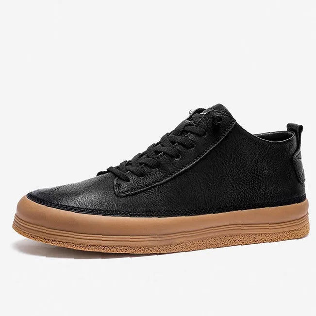 Men's black casual leather shoes with a round toe and lace-up front on a white background.