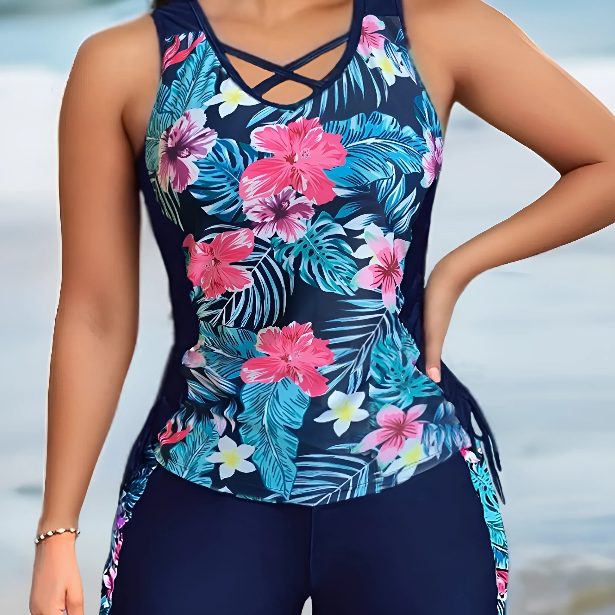 Plus size women's floral print high-waisted bikini for swimming in navy blue, black, green, and blue colours