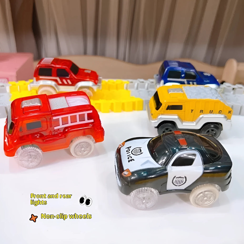 Red electric fire truck rail car with front and rear lights on toy track