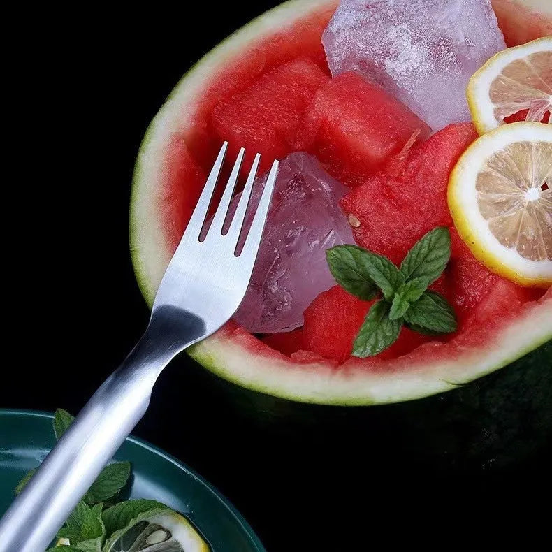 Silver stainless steel watermelon fork slicer with extended handle and rounded fork head