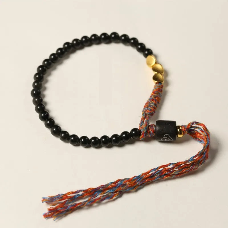 Obsidian coloured hand-woven carrying strap bracelet with 4mm width.