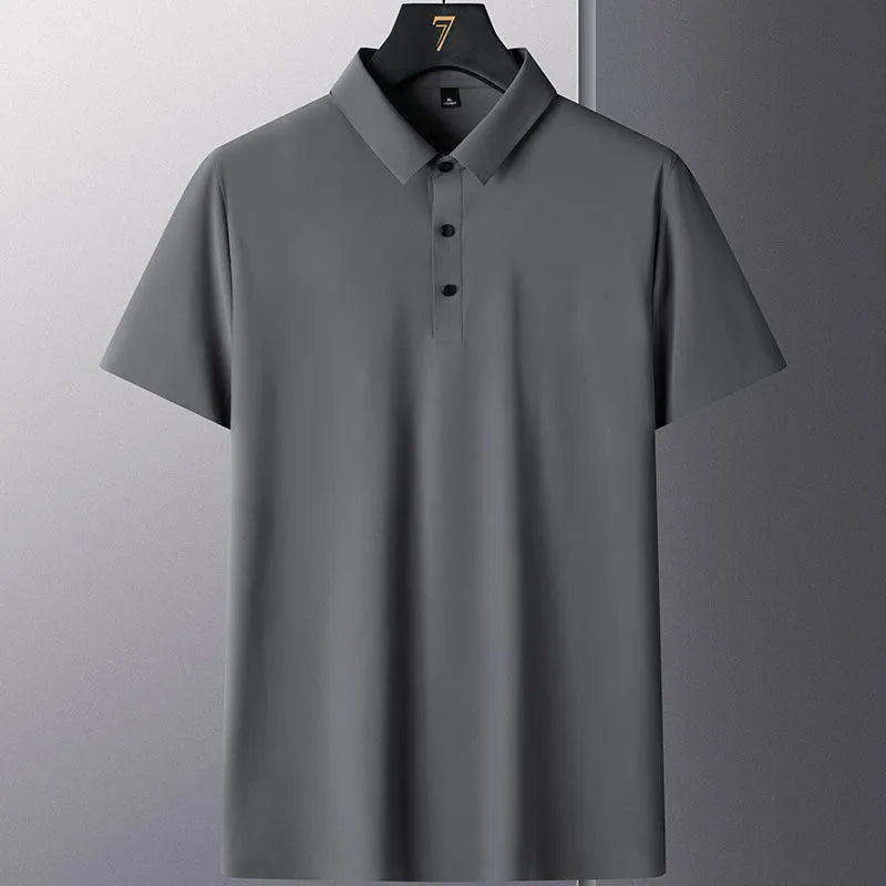 Man wearing a solid colour non-ironing business casual short sleeve shirt in a light blue shade.