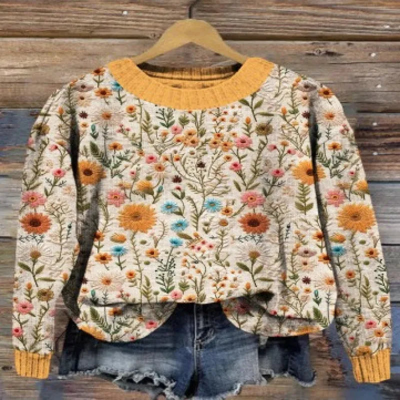 Digital printed floral pattern on a round neck polyester sweater, shown in one of multiple available colours.