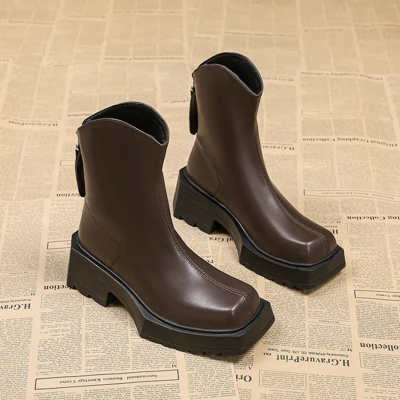 Black women's platform Martin ankle boots with square toe, back zipper, and a 6-8cm heel.