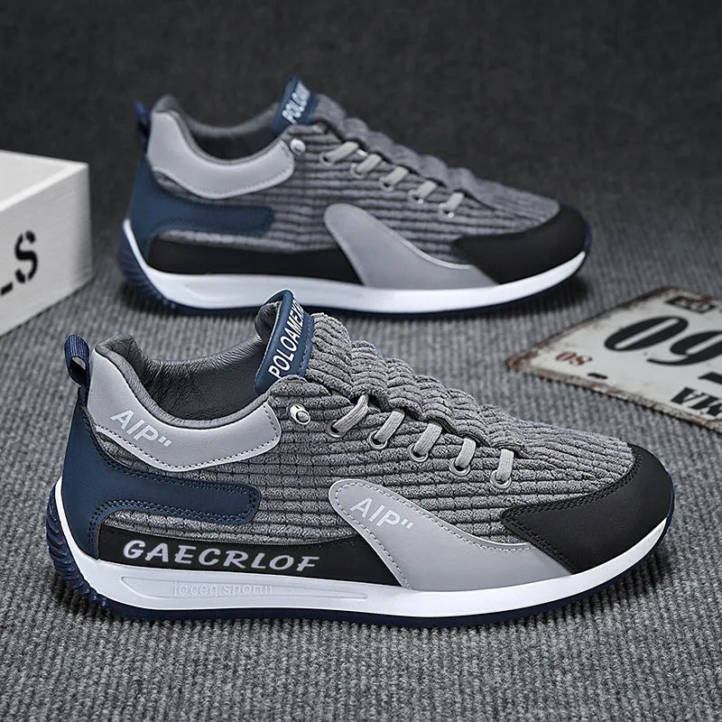 Men's green and grey mesh running shoes with lace-up front and viscose sole