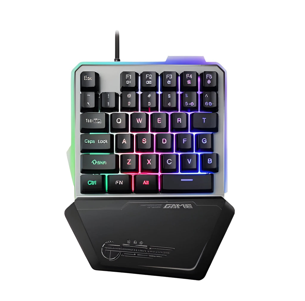 Black robotic one-handed mechanical keyboard with RGB backlit keys on a desk.