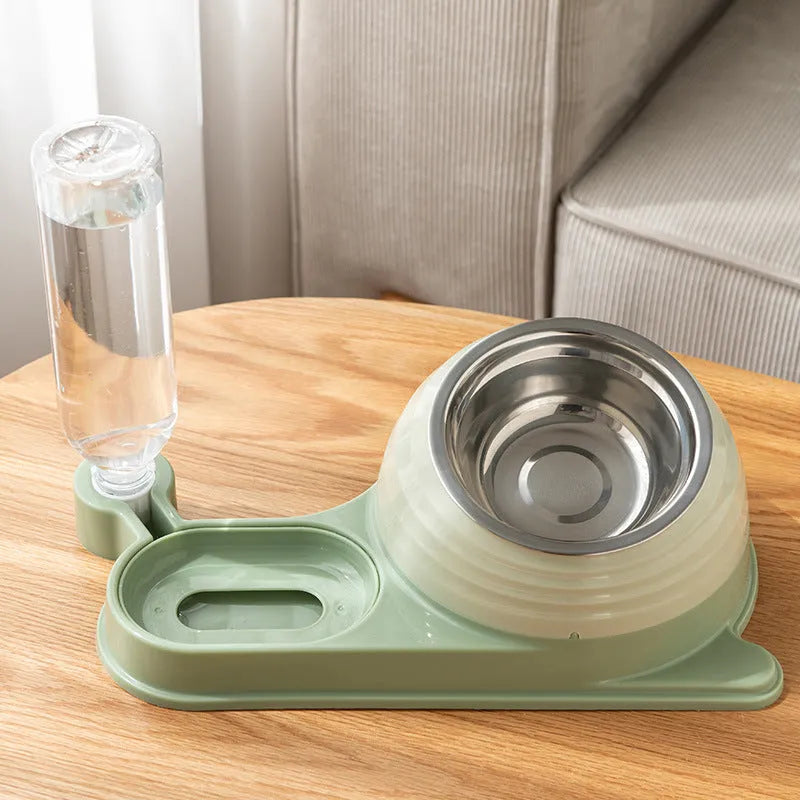 Raised cat feeder bowl with attached water bottle dispenser in green colour