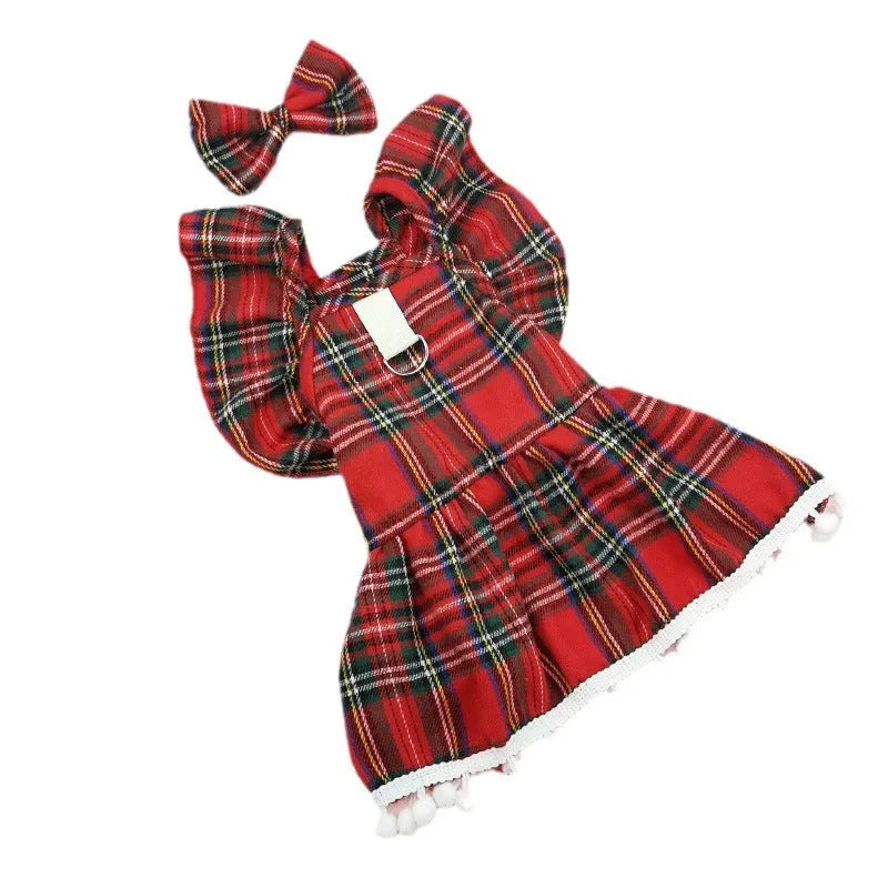Red tartan Christmas skirt outfit with bow tie and head flower on a small dog or cat.