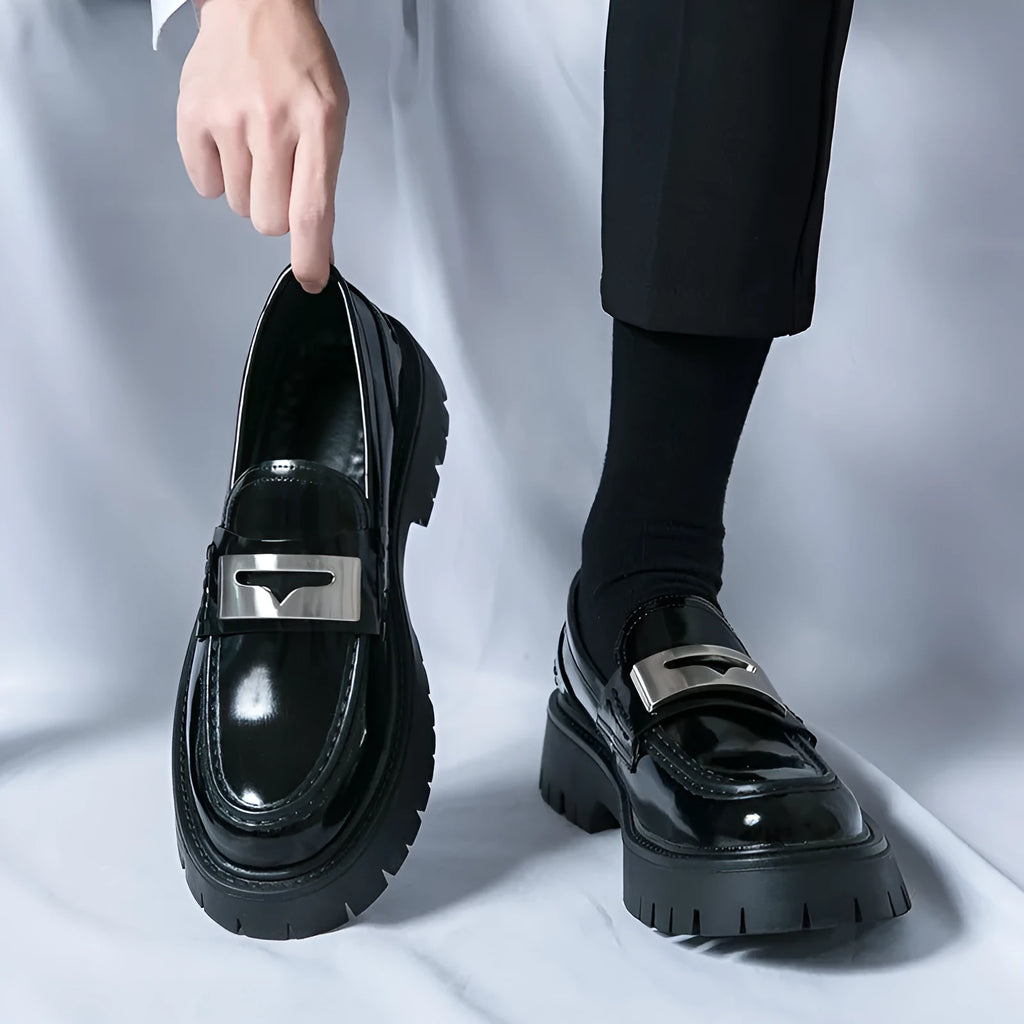 Men's glossy black platform loafers with hidden low heel, showing PU leather construction