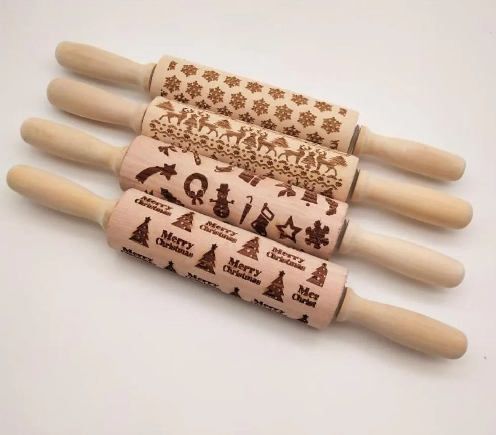 Wooden rolling pin with embossed Christmas patterns including reindeer and snowflakes on a 45cm length.