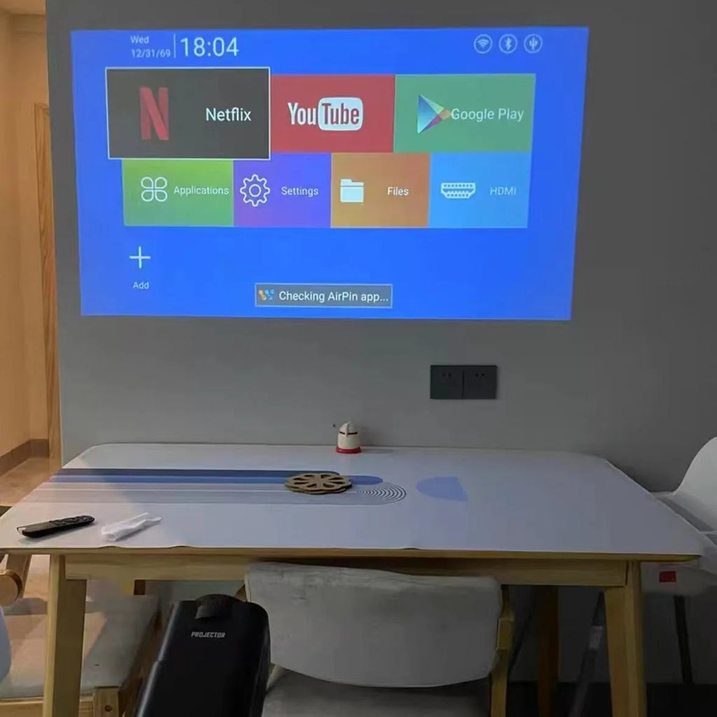 720p wireless home projector unit on a table