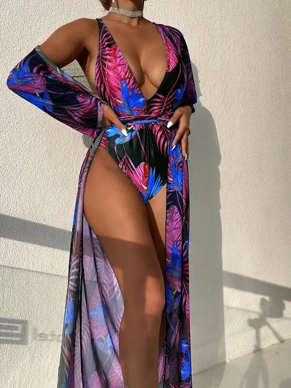 Women's polyester three-piece swimsuit bikini set with coat in a pattern design.