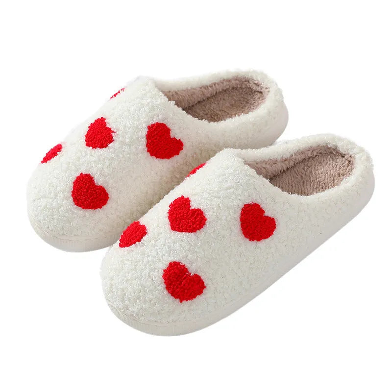 Womens plush cartoon slippers with a round toe and non-slip PVC sole in various colour designs.