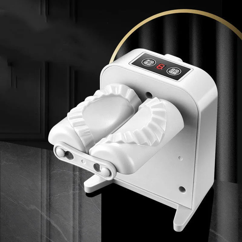 White electric dumpling maker machine with modern design on kitchen countertop