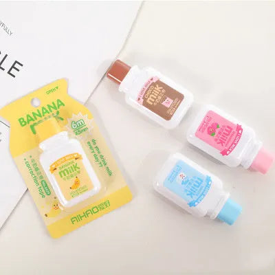 White creative correction tape dispenser shaped like a cute bottle with a curved ergonomic design