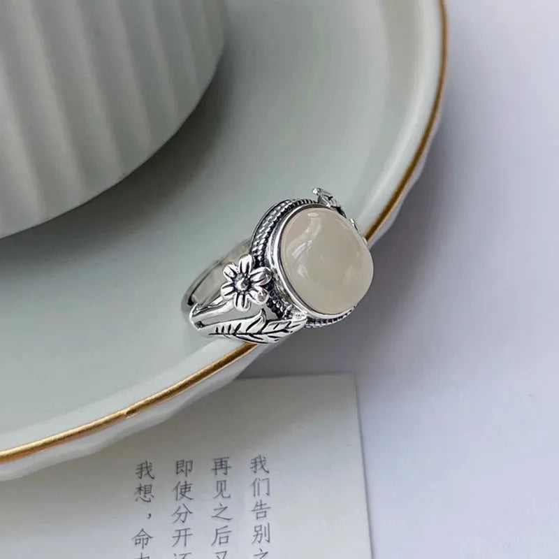Copper vintage ring with white chalcedony imitation stone and adjustable opening mechanism