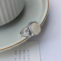 Copper vintage ring with white chalcedony imitation stone and adjustable opening mechanism