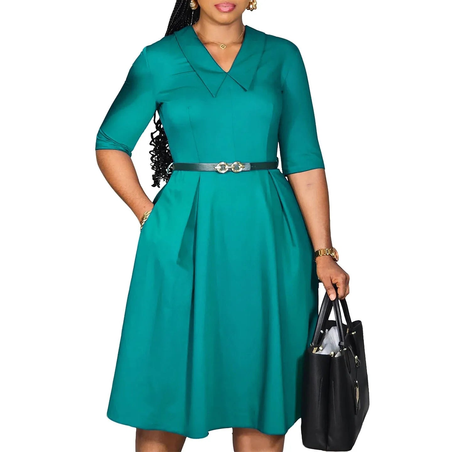 Solid colour African dress with half sleeves and a matching belt, shown on a hanger.