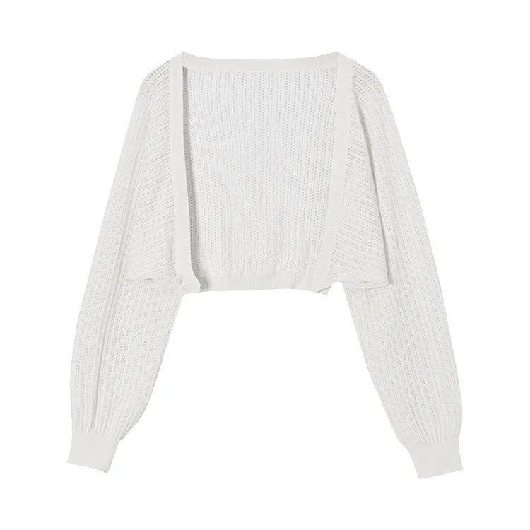 Thin polyester linen blouse with hollow out pattern and long lantern sleeves in apricot colour.