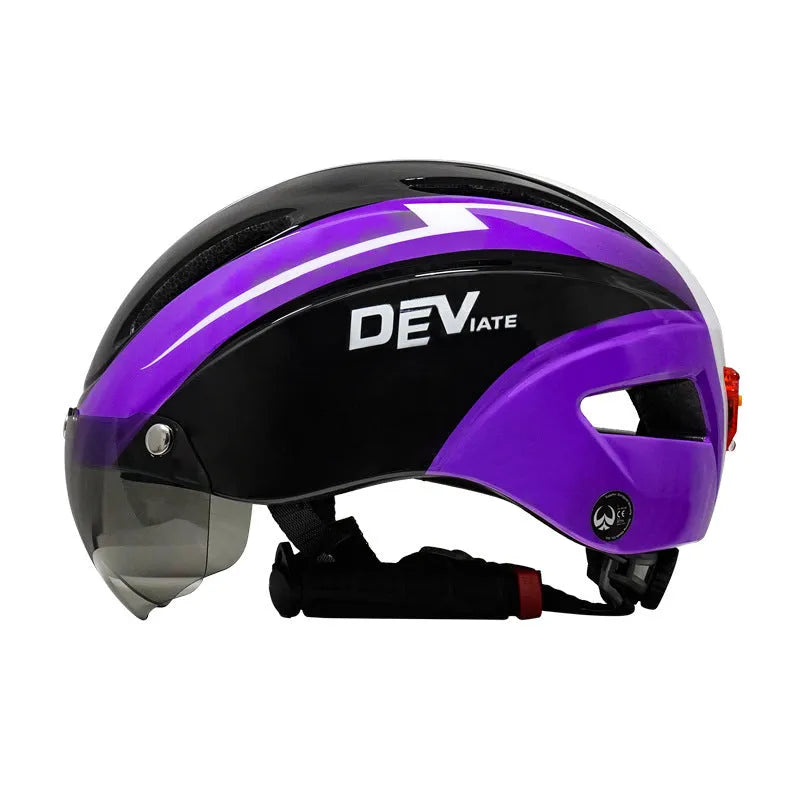 Adult bicycle helmet with integrated red taillight on the rear, shown in a black and blue colour variant.