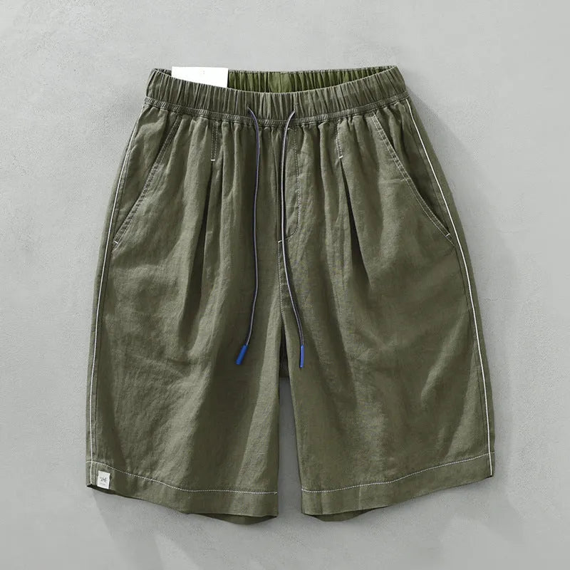 Men's straight-leg linen shorts in black or green with drooping style and drawstring mid-waist.
