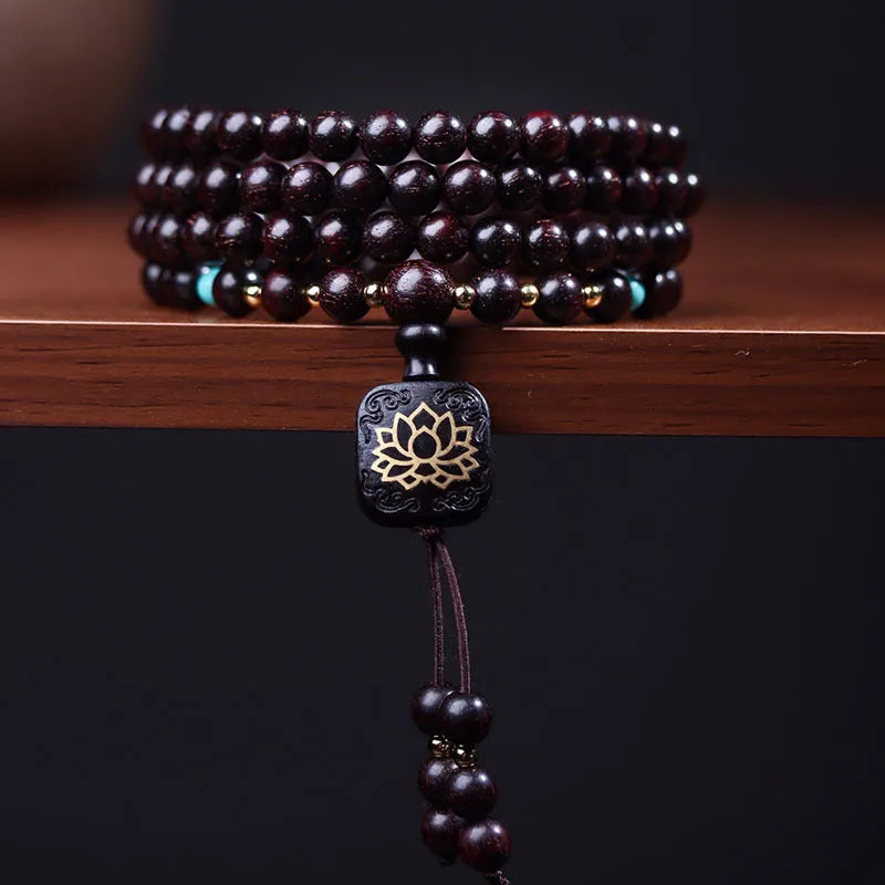 Zambian rosewood bead bracelet with 108 flat lotus pendant beads measuring 0.6 cm each