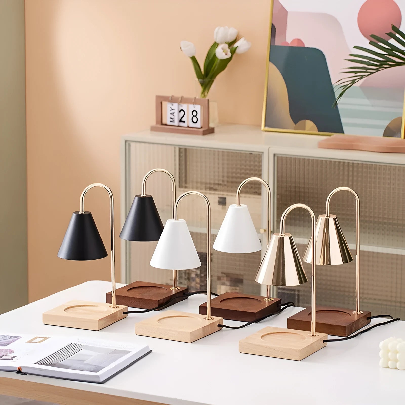 Wax melting lamp with oak wood base and white iron lampshade on a bedside table