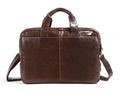 Brown cowhide leather business briefcase open showing interior polyester cotton lining and 18-inch laptop storage