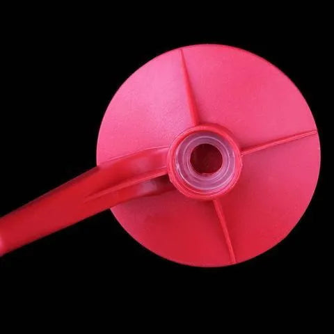 Red Magic Tap soda dispenser pump attached to a 2 litre bottle