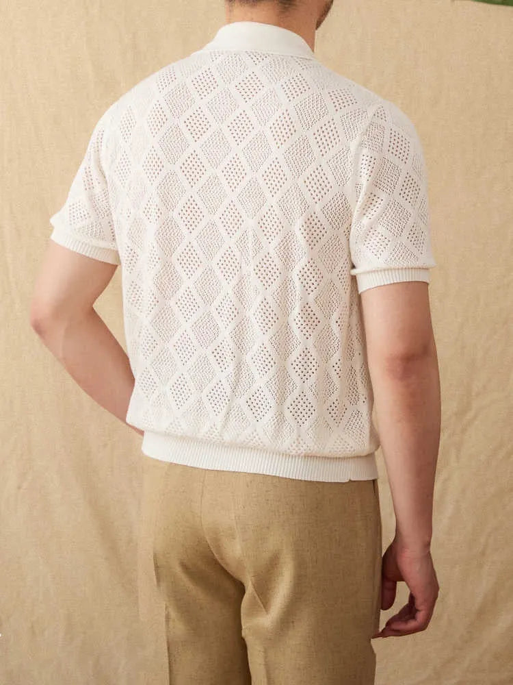 Men's light brown cotton cardigan with lapel collar, zipper front, and short sleeves laid flat.