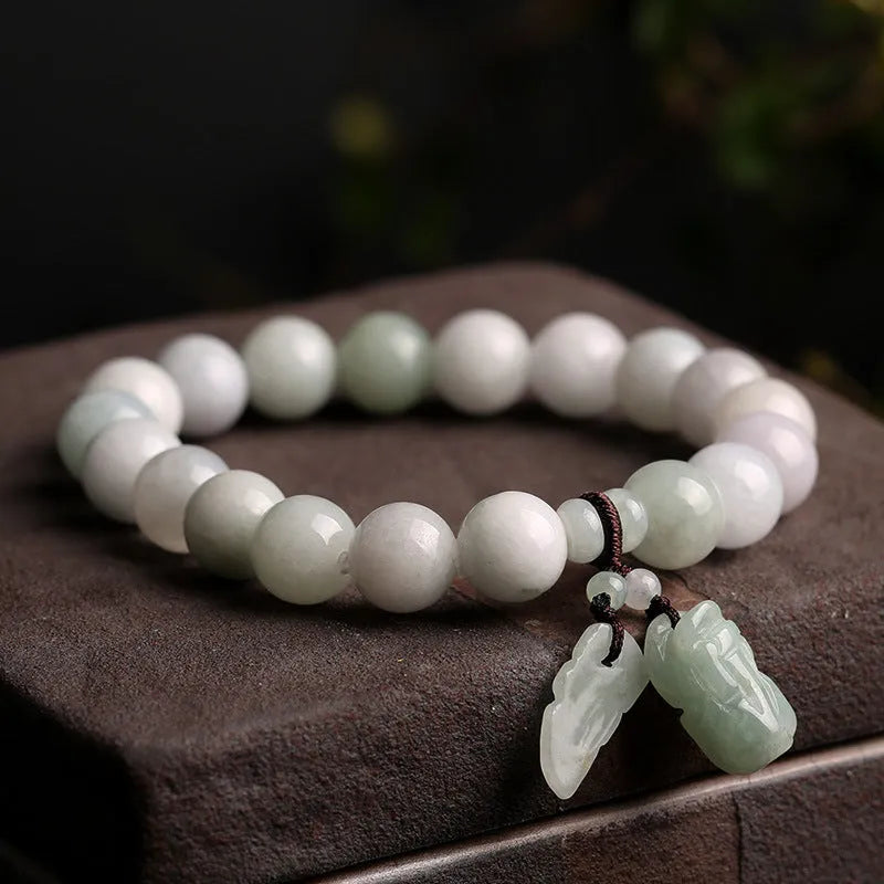 Natural jade Buddhist prayer bracelet with geometric beads and hanging charm pendant