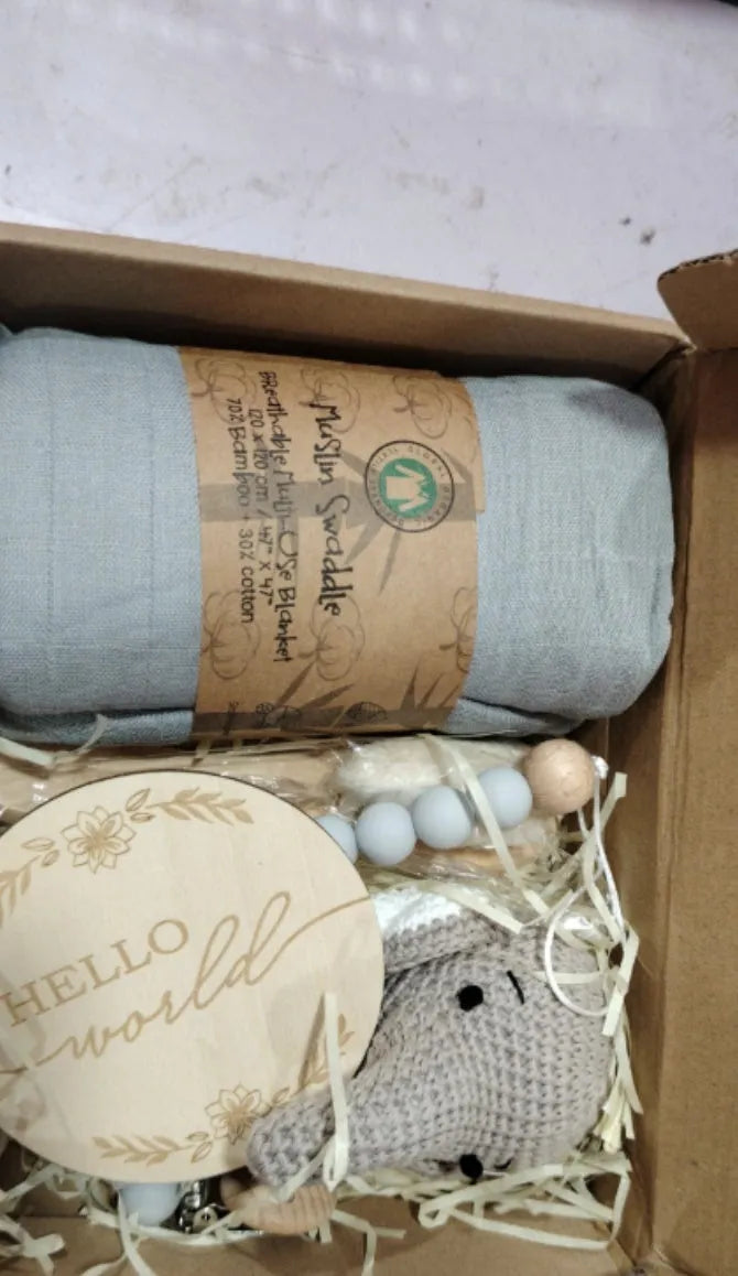 Baby teething gift set with wooden toys and large bamboo-cotton gauze blanket in assorted colours