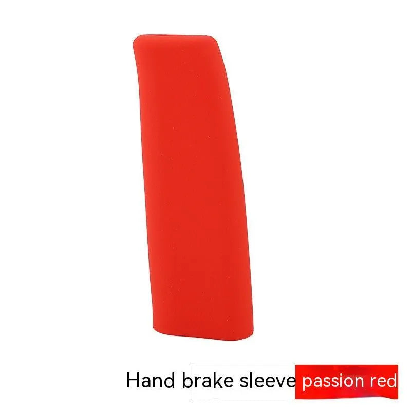 Universal silicone handbrake sleeve in red, shown next to a car's handbrake lever.