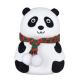 Panda-shaped soft silicone night light with USB rechargeable battery on a table.