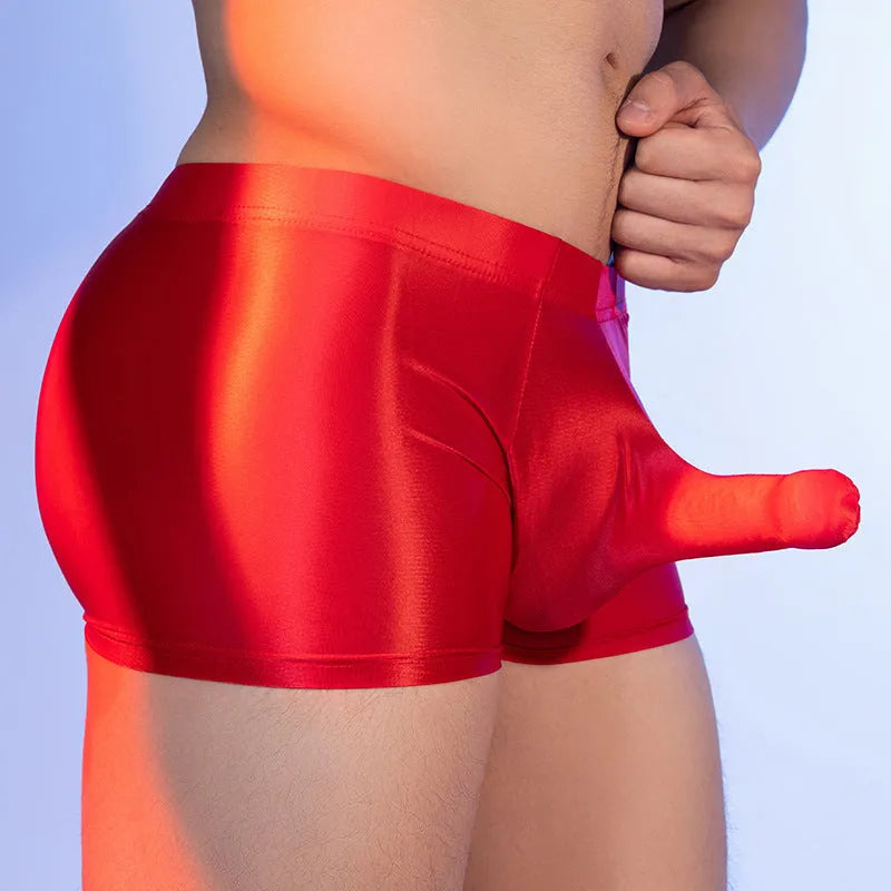 Red men's elephant print seamless boxer shorts on a mid-waist mannequin