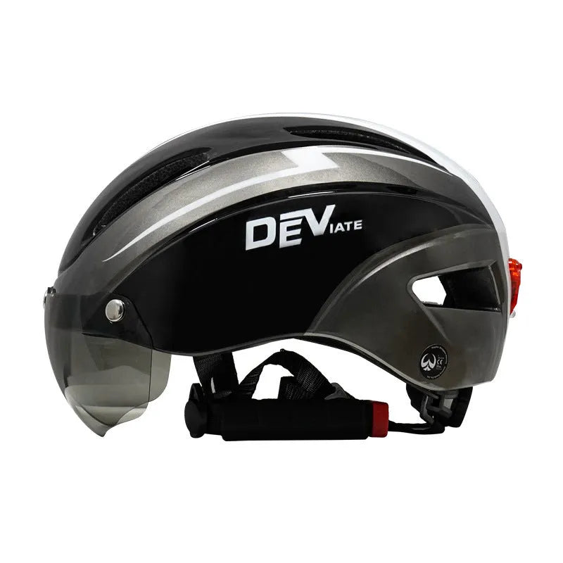 Adult bicycle helmet with integrated red taillight on the rear, shown in a black and blue colour variant.