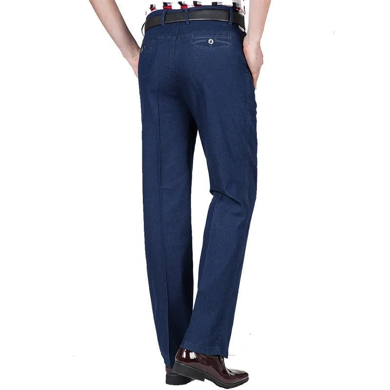 Men's high-waist loose-fit blue denim jeans with a zip fly, shown in light blue.