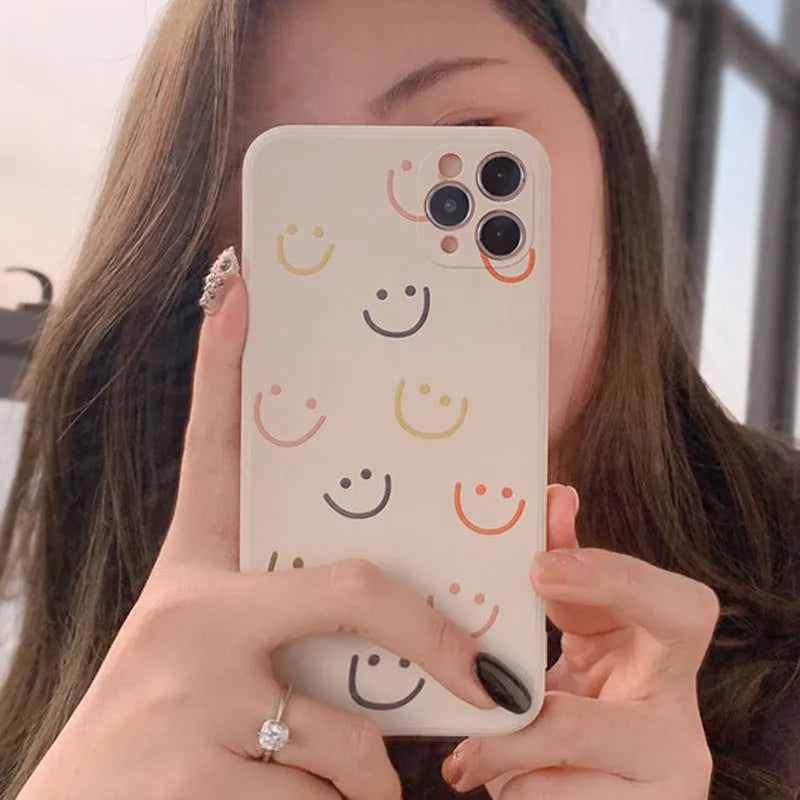 Silicone phone case with smiley design for Apple iPhone models in TPU material