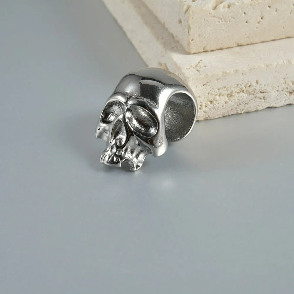 Stainless steel hollow skull and Buddha head geometric earrings for men and women.