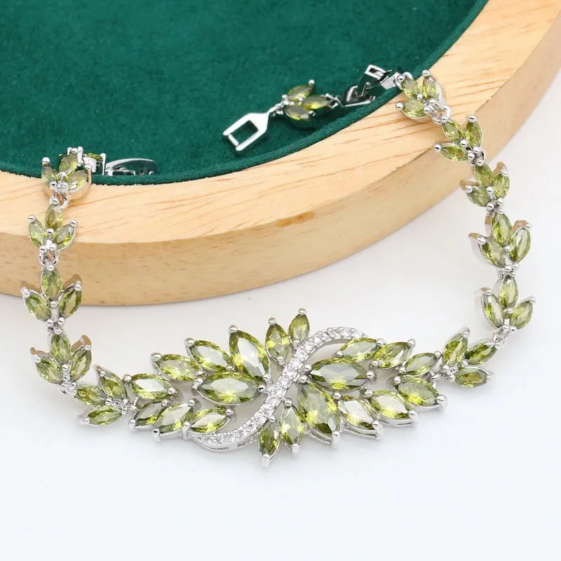 Retro copper zircon jewellery set with floral pattern showing necklace, bracelet, ring, and earrings in olive purple colours