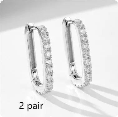 S925 sterling silver oval zircon earrings with geometric design and clip-on fitting