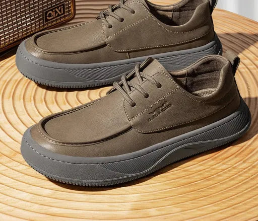 Brown leather retro casual shoes for men with a distinctive big toe design and visible stitching.